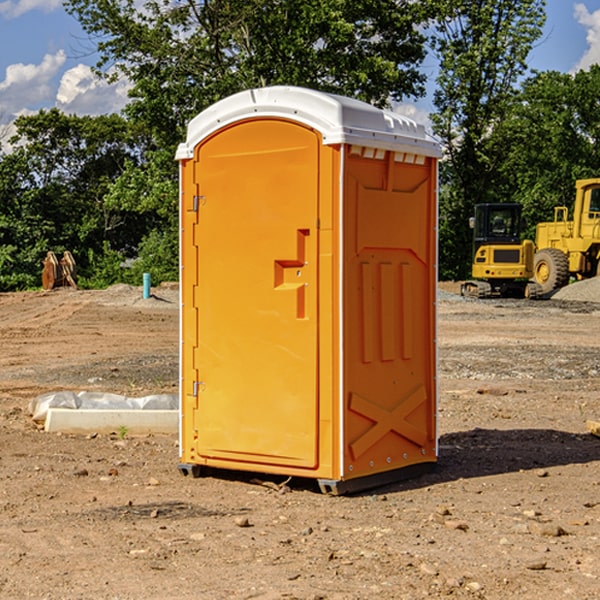 how often are the portable restrooms cleaned and serviced during a rental period in Ashley Michigan